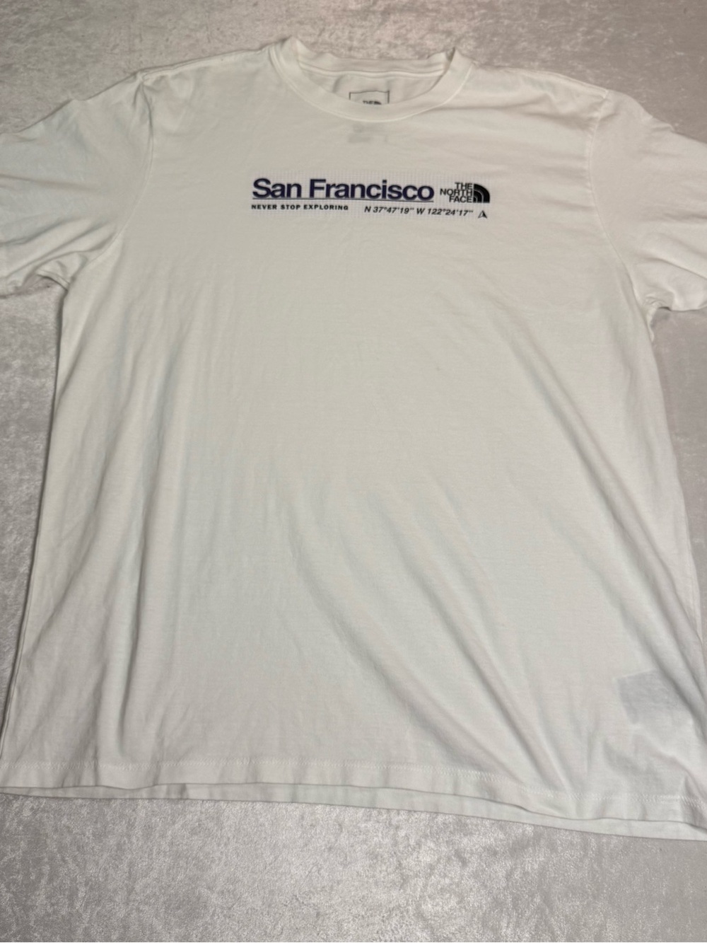The North Face White Men’s Short Sleeve City Tee Featuring a San Francisco Logo